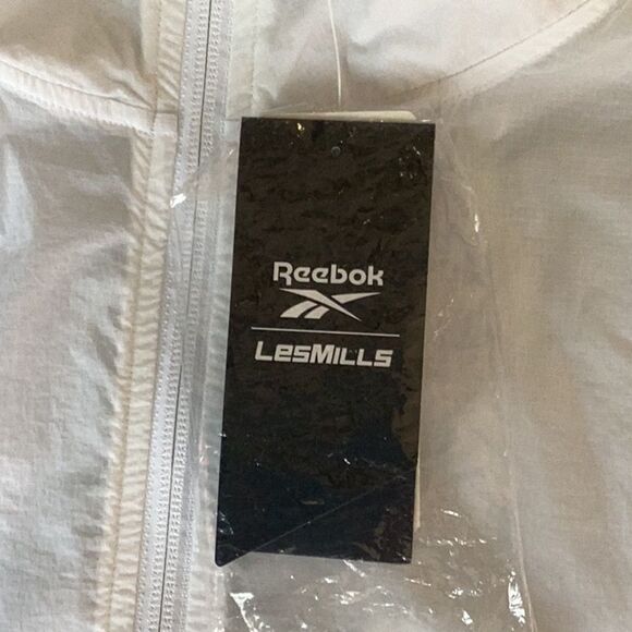 REEBOK NWT UNISEX LESMILLS TRACK  PERFORMANCE JACKET COAT ZIP UP WINDBREAKER SM - Picture 10 of 12